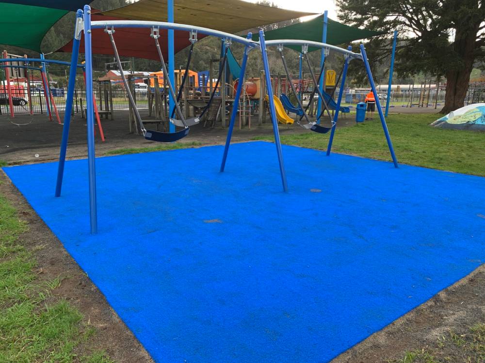 TigerTurf TigerPlay with a 22mm Power Pad built for safe, all-weather fun on the swings